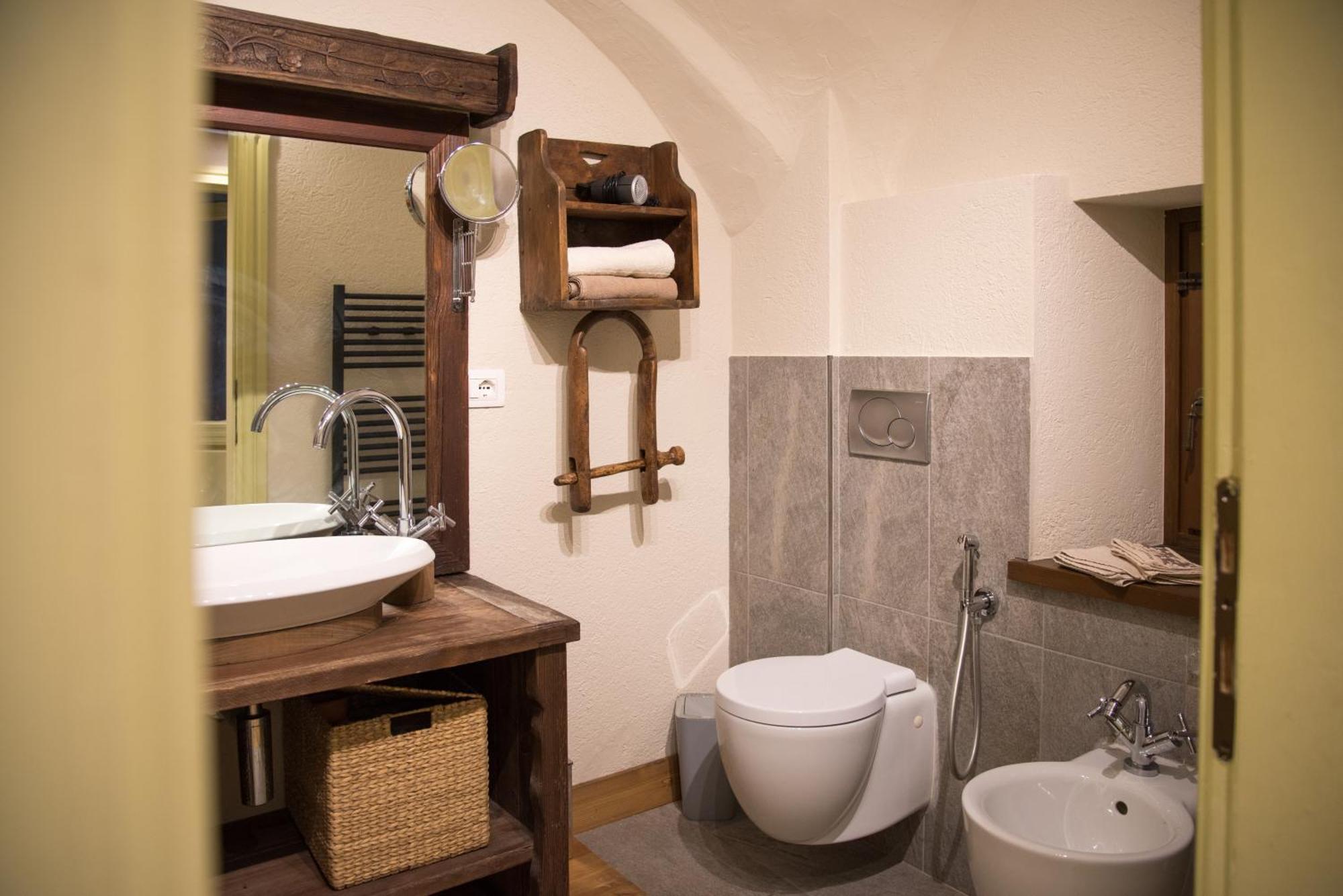 Le Bibelot Apartments Nus Szoba fotó