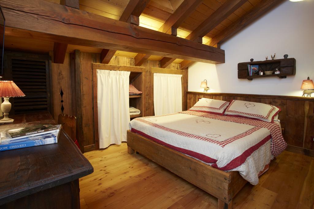 Le Bibelot Apartments Nus Szoba fotó